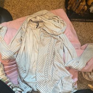 A white and gray striped cardigan